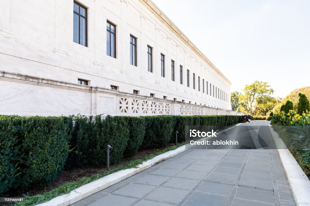 Washington DC, USA Exterior facade of Supreme Court building architecture and park path on Capital capitol hill with nobody American Culture Stock Photo
