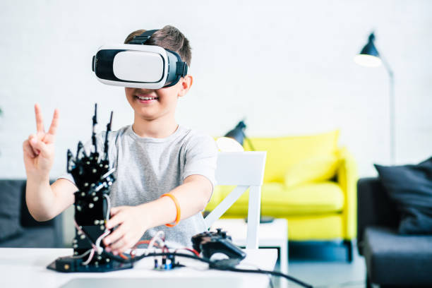 istock Waist up of a jubilant boy preparing his robotic device 1131467105