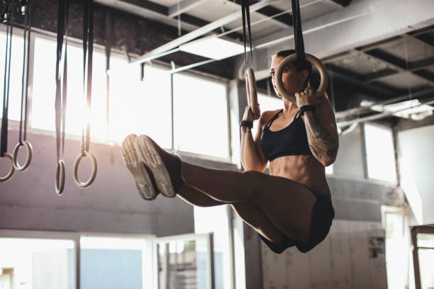 istock Women on gymnastic rings 1131470058