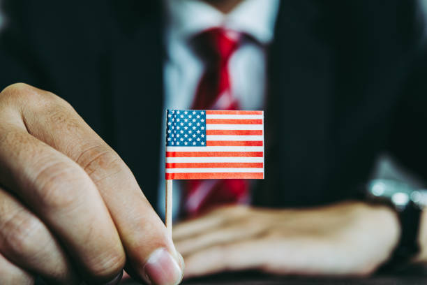 istock American flag and men suits 1131471497
