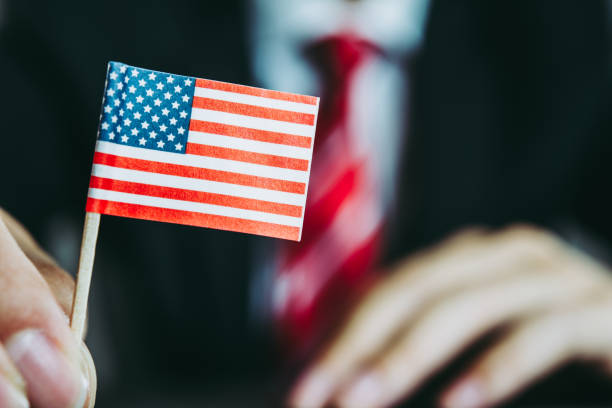 istock American flag and men suits 1131471504