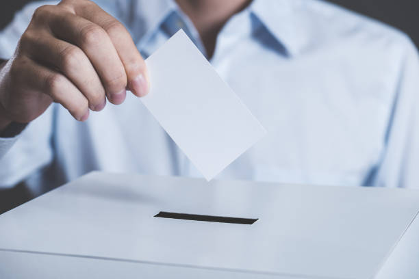istock Men and ballot box 1131471525