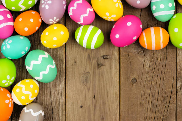 istock Colorful Easter Egg corner border on a wood background 1131481260