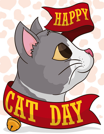 Smiling cat with greeting ribbon and a little bell, over a heart pattern background ready to celebrate Cat Day.