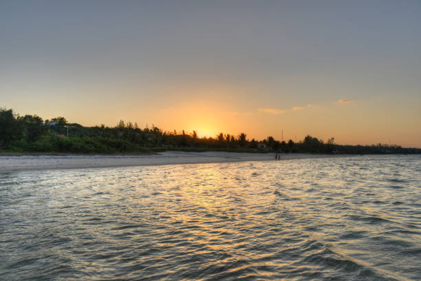 Panoramic View of Vilanculos Beach in Mozambique during high tide at sunset.