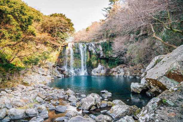 istock Cheonjeyeon waterfall in Jeju Island, Korea 1131512575