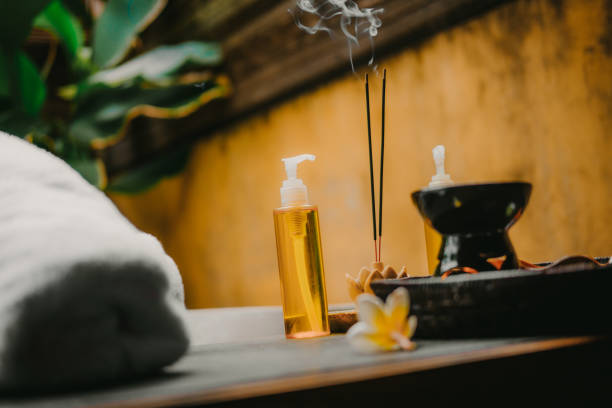 istock Spa salon, massage oils, incense sticks 1131517252