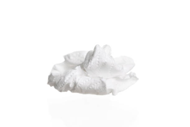 istock Screwed paper tissue isolated on white background 1131521536