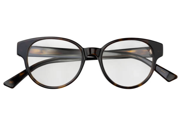 istock Black eyeglasses in round frame transparent for reading or good vision, top view isolated on white background 1131529340
