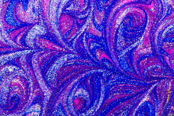 istock Abstract textured background of metallic glitter paint swirls 1131531473