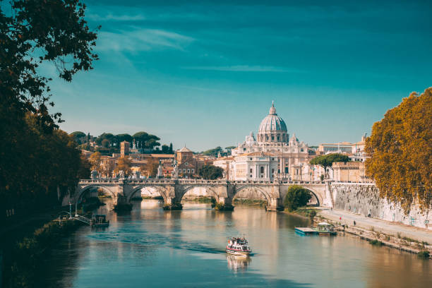 Rome, Italy. Papal Basilica Of St. Peter In The Vatican. Sightseeing Boat Floating Near Aelian Bridge. Touristic Boat Rome, Italy. Papal Basilica Of St. Peter In The Vatican. Sightseeing Boat Floating Near Aelian Bridge. Tour Touristic Boat basilica stock pictures, royalty-free photos & images