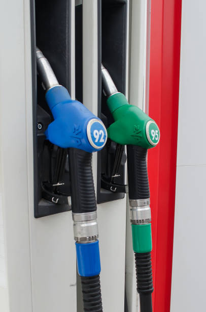 istock Gas pump nozzles in a service station 1131539093