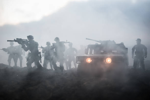 military patrol car on sunset background. army war concept. silhouette of armored vehicle with gun in action. decorated. selective focus - iraq conflict imagens e fotografias de stock