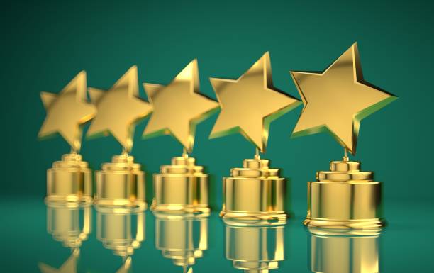 istock Five golden rating star in light green background. 1131542699