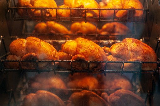 Chickens roasting in rotisserie