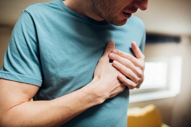 Man with chest pain stock photo