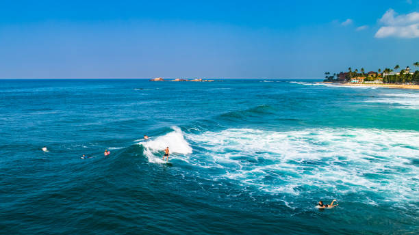 Aerial. Surfers. Hikkaduwa, Sri Lanka. stock photo