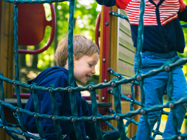 istock Little boy playing on a playground. Activity 1131550460