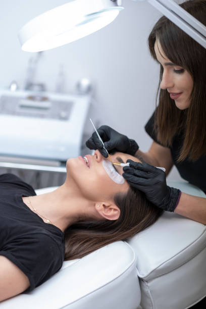 istock The procedure of eyelash extension 1131551460