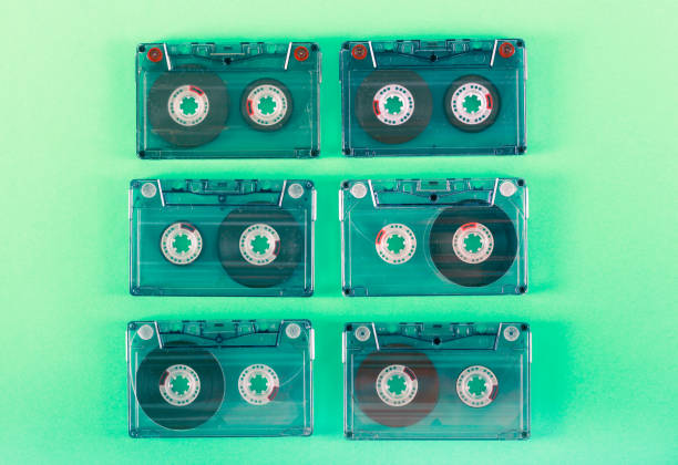 istock Retro audio cassettes over green background 1131552024