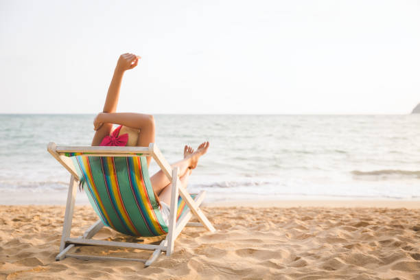 istock Woman on beach in summer 1131552711