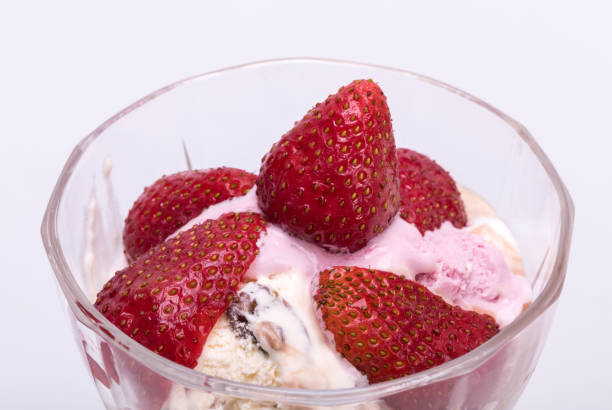 istock ice cream and fresh ripe strawberries  isolated on white background 1131560585