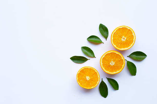 istock High vitamin C. Fresh orange citrus fruit with leaves isolated on white. 1131561753