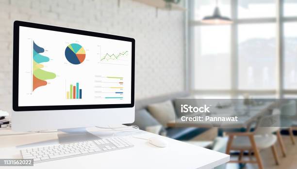 Computer Table Or Chart Modern Computer With Keyboard And Mouse On White Table Showing Charts ...
