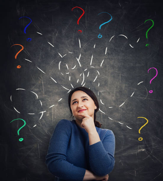 istock woman having questions 1131563504