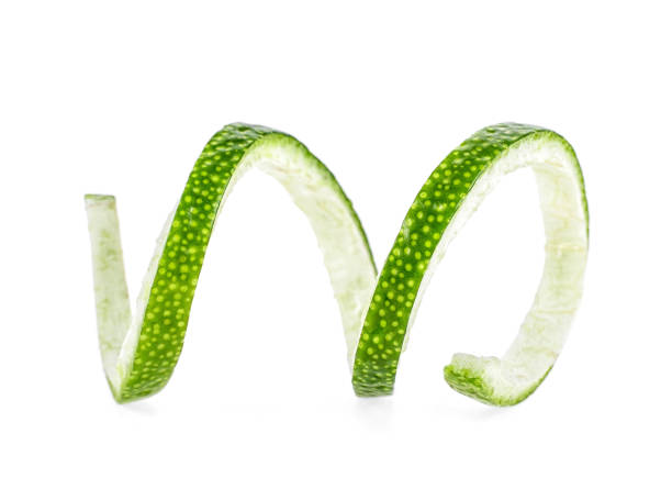 istock Peel of lime over white background, closeup. 1131564374