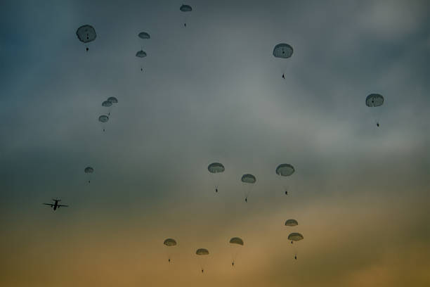 Soldiers jumps from military airplane at the training.