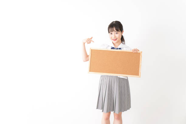 istock Young woman holding a board 1131571770
