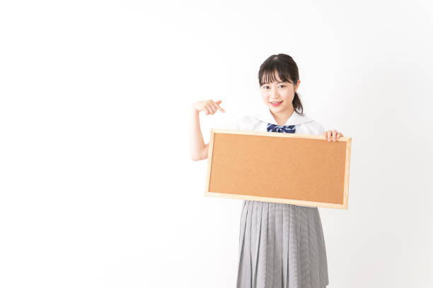 istock Young woman holding a board 1131571772