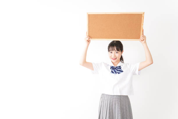 Young woman holding a board