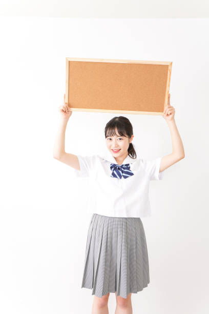 istock Young woman holding a board 1131571779