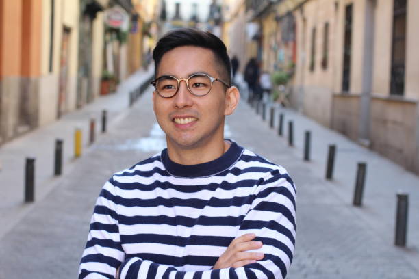 istock Sophisticated Asian man outdoors portrait 1131573075