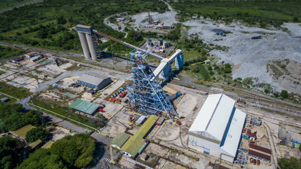 istock Abandoned mine shaft headgear seen from above on a sunny day 1131574906