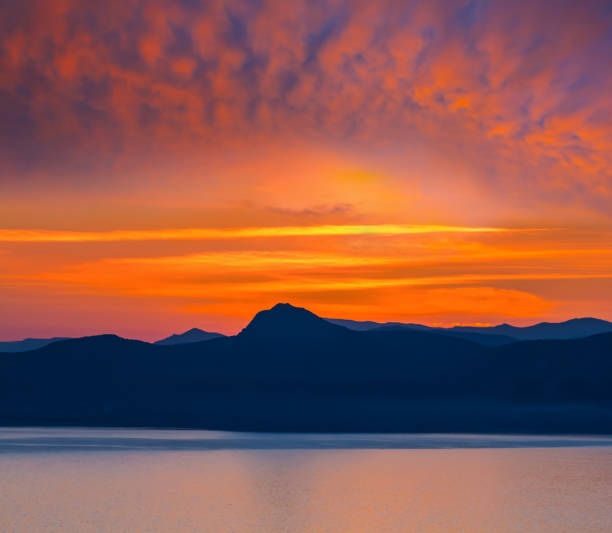 istock red dramatic sunset over the sea bay 1131576692