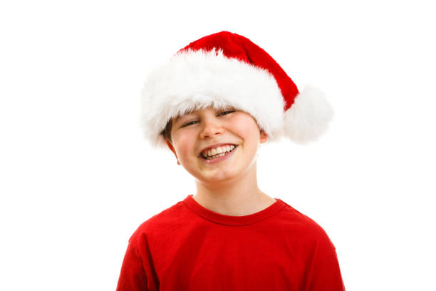 istock Christmas time - boy with Santa Clause hat 1131577049