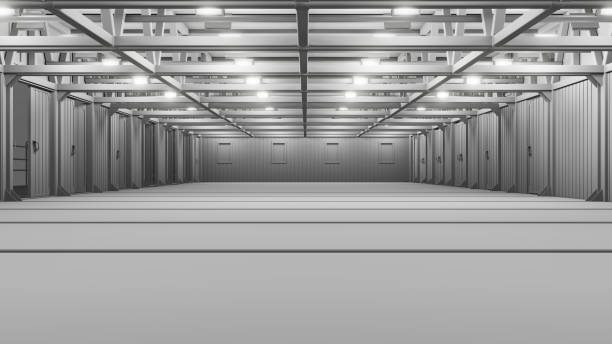 istock Empty commercial warehouse with bright lamps 1131577872