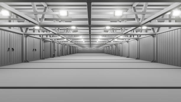 istock Empty commercial warehouse with bright lamps 1131577971