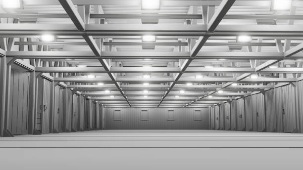 istock Empty commercial warehouse with bright lamps 1131578004