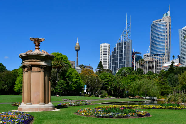 Sydney, NSW, Australia - October 28, 2017: Choragic monument of Lysicrates in Royal Botanic Garden, buildings and Centrepoint Tower
