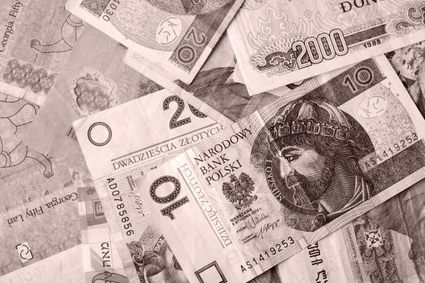 istock Different countries money background close up. Brown color toned 1131579348