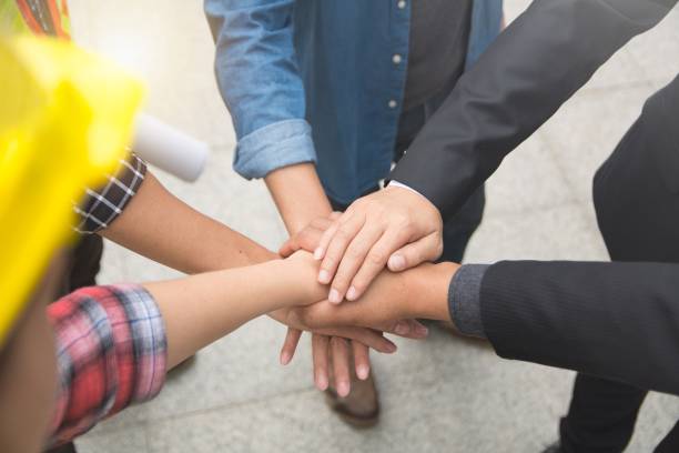 istock Hands put together to show unity and cooperation 1131581841