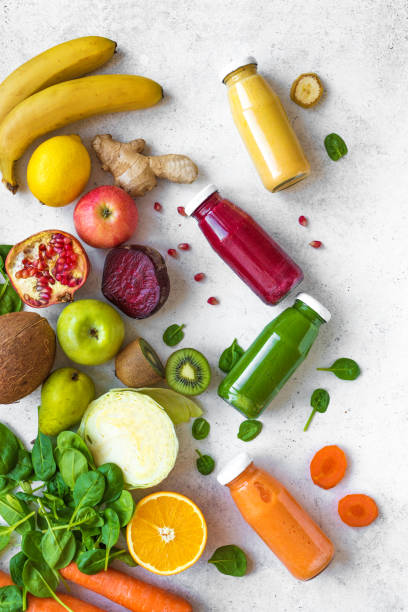 istock Colorful smoothie bottles and ingredients 1131583008