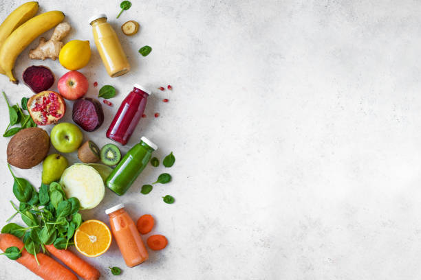 istock Colorful smoothie bottles and ingredients 1131583009