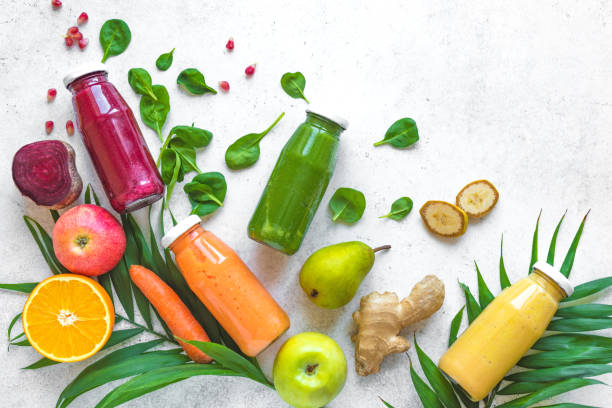 istock Colorful smoothie bottles and ingredients 1131583025