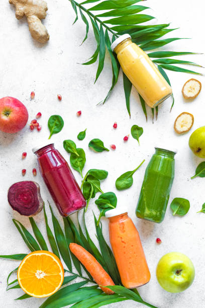istock Colorful smoothie bottles and ingredients 1131583029