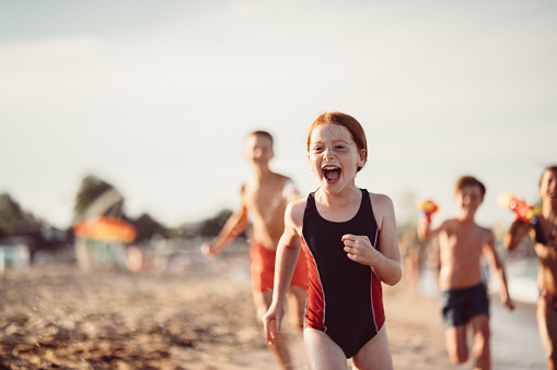 Kids playing at the beach